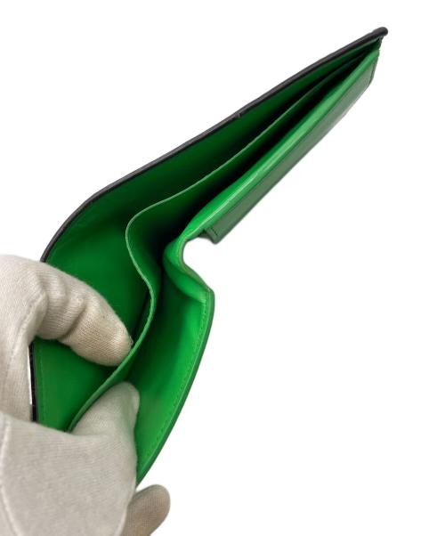 BOTTEGA VENETA（ボッテガベネタ）BOTTEGA VENETA (ボッテガベネタ) 2つ折り財布 ブラック×グリーンの古着・服飾アイテム