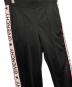 中古・古着 GIVENCHY (ジバンシィ) ロゴサイドライントラックパンツ ブラック サイズ:S：12000円