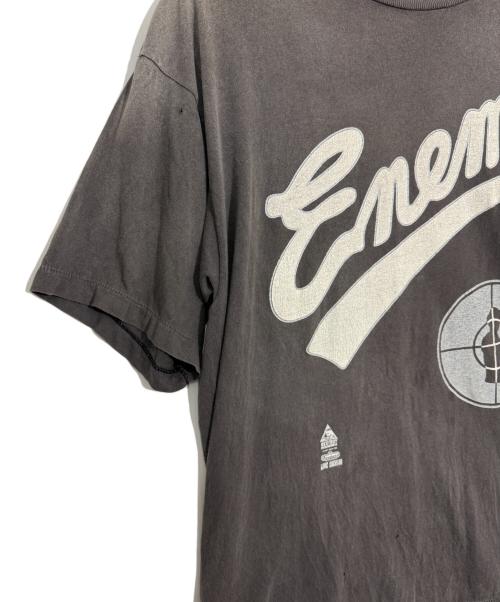 SAINT MICHAEL（セントマイケル）SAINT MICHAEL (セントマイケル) PUBLIC ENEMY (パブリック エネミー) Tシャツ チャコールグレー サイズ:Lの古着・服飾アイテム