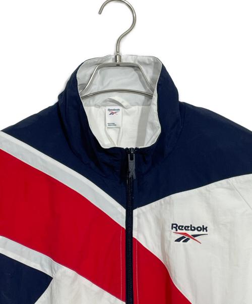 REEBOK（リーボック）REEBOK (リーボック) トラックジャケット ホワイト×レッド×ネイビー サイズ:Mの古着・服飾アイテム