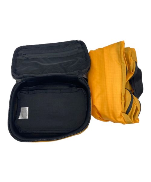 THE NORTH FACE（ザ ノース フェイス）THE NORTH FACE (ザ ノース フェイス) STANDARD (スタンダード) ポーチ イエロー 未使用品の古着・服飾アイテム