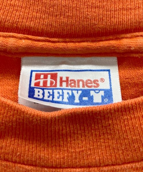 Hanes（ヘインズ）Hanes (ヘインズ) SAURUS (ザウルス) Tシャツ オレンジ サイズ:Lの古着・服飾アイテム