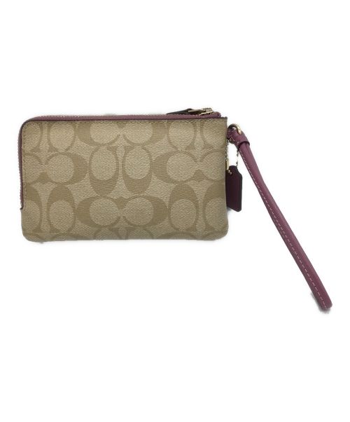 COACH（コーチ）COACH (コーチ) ポーチ ベージュ×ピンクの古着・服飾アイテム