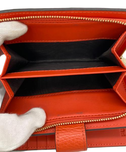 FURLA（フルラ）FURLA (フルラ) 2つ折り財布 オレンジの古着・服飾アイテム