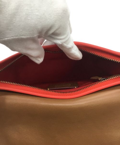 DISNEY（ディズニー）DISNEY (ディズニー) COACH (コーチ) ショルダーバッグ レッドの古着・服飾アイテム