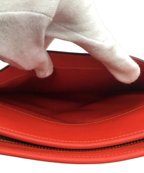 DISNEY（ディズニー）DISNEY (ディズニー) COACH (コーチ) ショルダーバッグ レッドの古着・服飾アイテム