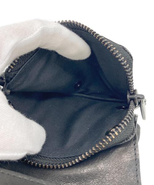 PATRICK STEPHAN（パトリックステファン）PATRICK STEPHAN (パトリックステファン) 2つ折り財布 ブラックの古着・服飾アイテム