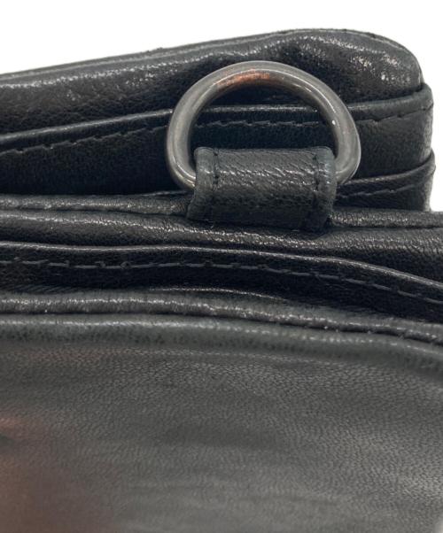 PATRICK STEPHAN（パトリックステファン）PATRICK STEPHAN (パトリックステファン) 2つ折り財布 ブラックの古着・服飾アイテム