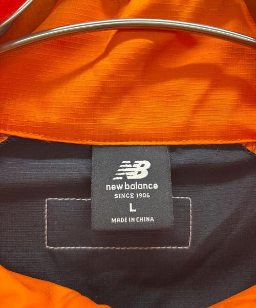 NEW BALANCE（ニューバランス）NEW BALANCE (ニューバランス) Kervin Brisseaux バスケットボールジャケット オレンジ×ブラック サイズ:XLの古着・服飾アイテム