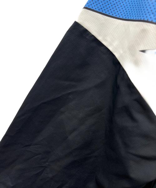 NEW BALANCE（ニューバランス）NEW BALANCE (ニューバランス) Kervin Brisseaux バスケットボールジャケット オレンジ×ブラック サイズ:XLの古着・服飾アイテム