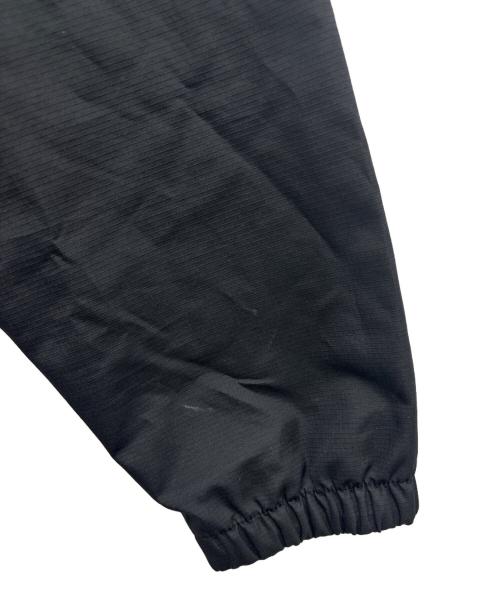 NEW BALANCE（ニューバランス）NEW BALANCE (ニューバランス) Kervin Brisseaux バスケットボールジャケット オレンジ×ブラック サイズ:XLの古着・服飾アイテム