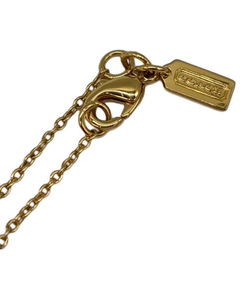 COACH（コーチ）COACH (コーチ) オプアート パヴェハート ゴールド×ピンクの古着・服飾アイテム