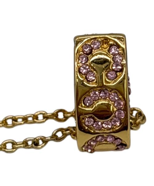 COACH（コーチ）COACH (コーチ) オプアート パヴェハート ゴールド×ピンクの古着・服飾アイテム