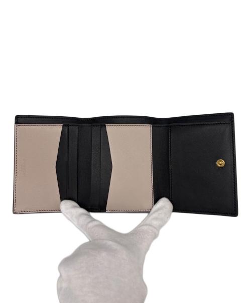 GIVENCHY（ジバンシィ）GIVENCHY (ジバンシィ) 3つ折り財布 アイボリーの古着・服飾アイテム