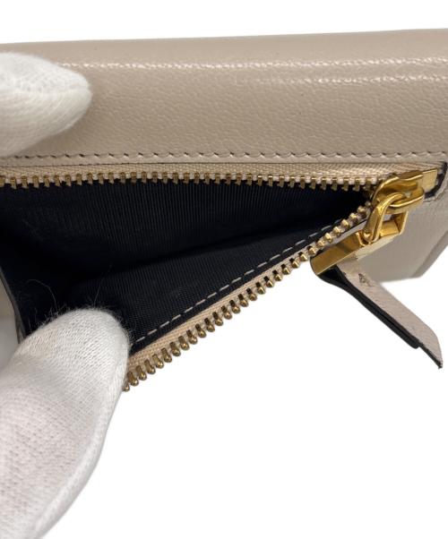 GIVENCHY（ジバンシィ）GIVENCHY (ジバンシィ) 3つ折り財布 アイボリーの古着・服飾アイテム