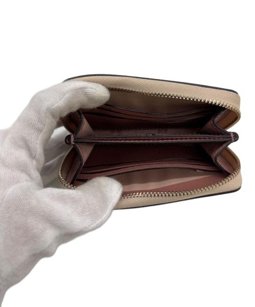 Kate Spade（ケイトスペード）Kate Spade (ケイトスペード) カードケース ベージュ×ブラックの古着・服飾アイテム