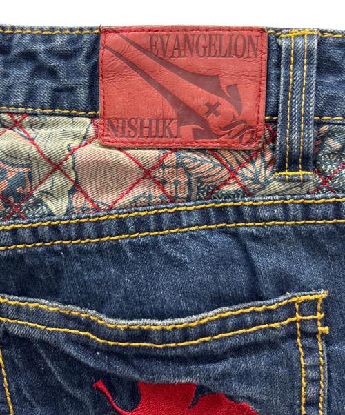 錦（ニシキ）錦 (ニシキ) エヴァンゲリオン (エヴァンゲリオン) 刺繍デニムパンツ インディゴ サイズ:32の古着・服飾アイテム