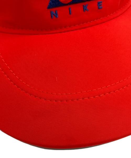 NIKE（ナイキ）NIKE (ナイキ) テイルウィンドキャップ オレンジの古着・服飾アイテム