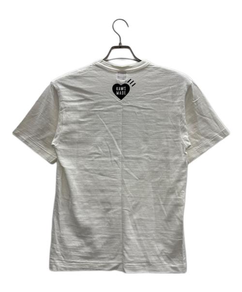 HUMAN MADE（ヒューマンメイド）HUMAN MADE (ヒューマンメイド) KAWS (カウズ) グラフィック Tシャツ ホワイト×グリーン サイズ:Sの古着・服飾アイテム