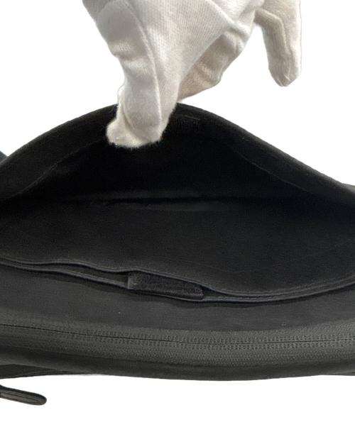 super consumer（スーパーコンシューマー）super consumer (スーパーコンシューマー) ひらくPCバッグ ブラックの古着・服飾アイテム