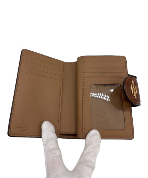 COACH（コーチ）COACH (コーチ) 2つ折り財布 ベージュ×ブラウンの古着・服飾アイテム