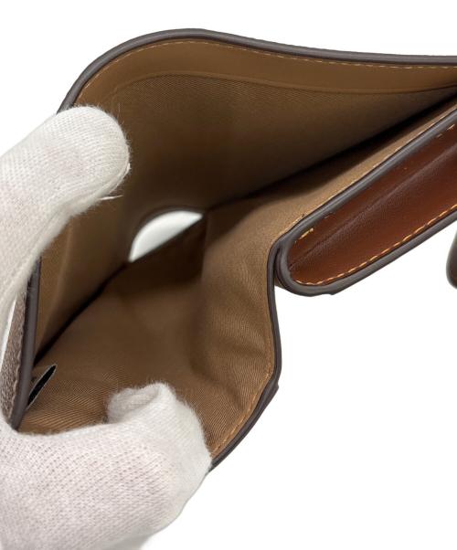 COACH（コーチ）COACH (コーチ) 2つ折り財布 ベージュ×ブラウンの古着・服飾アイテム