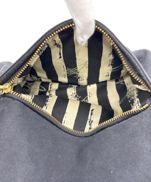 Vivienne Westwood（ヴィヴィアンウエストウッド）Vivienne Westwood (ヴィヴィアンウエストウッド) キャンバスバックパック ブラック×ゴールドの古着・服飾アイテム