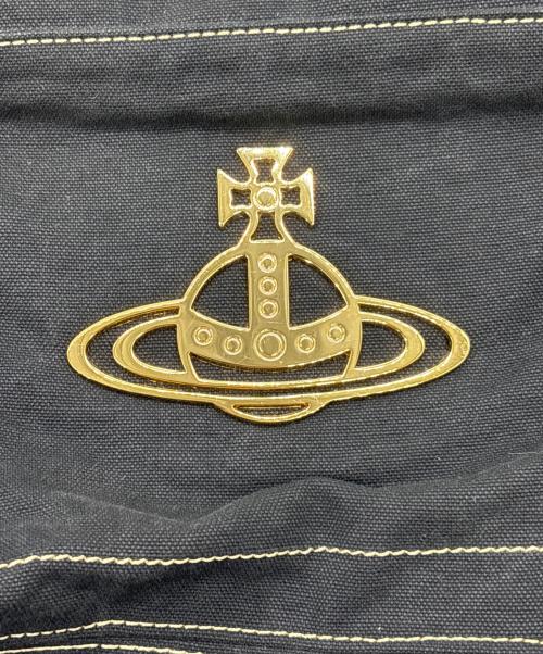 Vivienne Westwood（ヴィヴィアンウエストウッド）Vivienne Westwood (ヴィヴィアンウエストウッド) キャンバスバックパック ブラック×ゴールドの古着・服飾アイテム