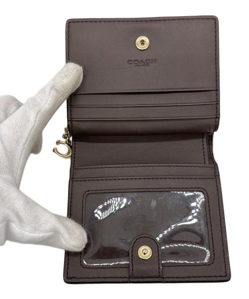 COACH（コーチ）COACH (コーチ) スナップウォレット ブラウンの古着・服飾アイテム
