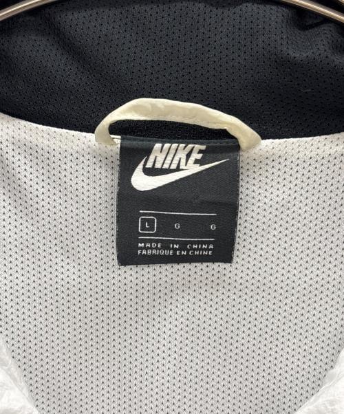 NIKE（ナイキ）NIKE (ナイキ) スウッシュ ウーブン フード付きジャケッ ホワイト×ブラック サイズ:Lの古着・服飾アイテム