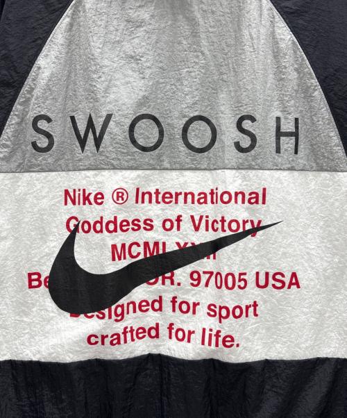NIKE（ナイキ）NIKE (ナイキ) スウッシュ ウーブン フード付きジャケッ ホワイト×ブラック サイズ:Lの古着・服飾アイテム