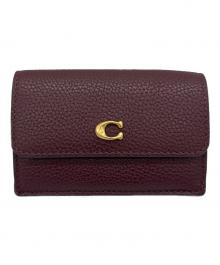 COACH（コーチ）の古着「ミニトライフォールド ウォレット」｜ブラウン