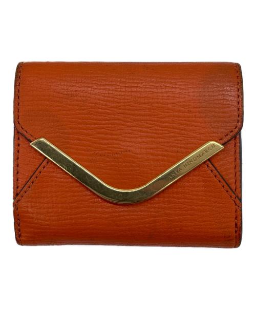 ANYA HINDMARCH（アニヤ・ハインドマーチ）ANYA HINDMARCH (アニヤ・ハインドマーチ) 3つ折り財布 オレンジの古着・服飾アイテム