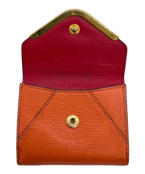 ANYA HINDMARCH（アニヤ・ハインドマーチ）ANYA HINDMARCH (アニヤ・ハインドマーチ) 3つ折り財布 オレンジの古着・服飾アイテム