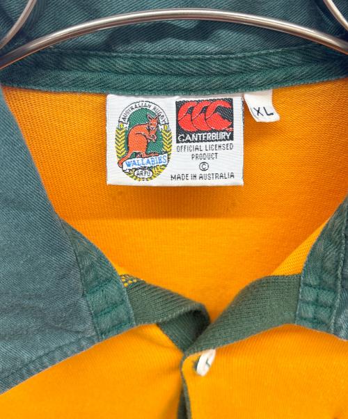 Canterbury（カンタベリー）Canterbury (カンタベリー) WALLABIES ラガーシャツ オレンジ×グリーン サイズ:XLの古着・服飾アイテム
