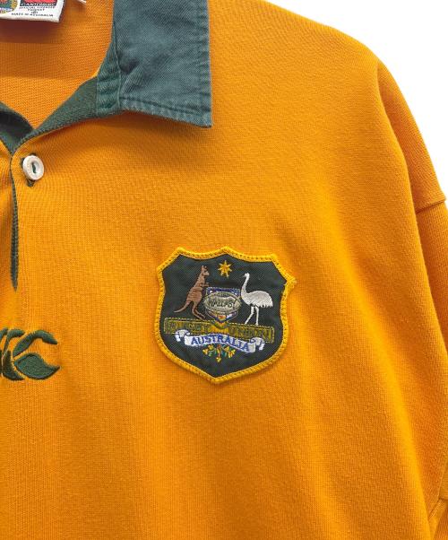 Canterbury（カンタベリー）Canterbury (カンタベリー) WALLABIES ラガーシャツ オレンジ×グリーン サイズ:XLの古着・服飾アイテム