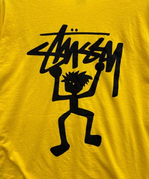 stussy（ステューシー）stussy (ステューシー) シャドーマンプリントTシャツ イエロー サイズ:XLの古着・服飾アイテム
