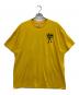 stussy（ステューシー）の古着「シャドーマンプリントTシャツ」｜イエロー
