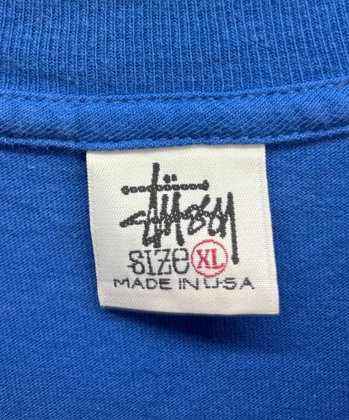 stussy（ステューシー）stussy (ステューシー) シャドーマンプリントTシャツ ブルー サイズ:XLの古着・服飾アイテム