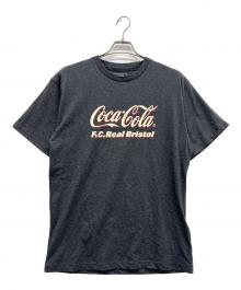 F.C.R.B.×Coca Cola（エフシーレアルブリストル×コカコーラ）の古着「Coca-Cola HEATHER TEE」｜ブラック