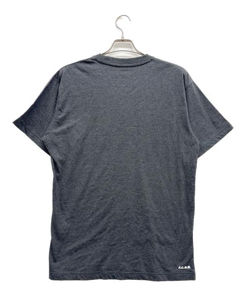 F.C.R.B.（エフシーレアルブリストル）F.C.R.B. (エフシーレアルブリストル) Coca Cola (コカコーラ) Coca-Cola HEATHER TEE ブラック サイズ:L 未使用品の古着・服飾アイテム