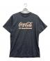 F.C.R.B.（エフシーレアルブリストル）の古着「Coca-Cola HEATHER TEE」｜ブラック