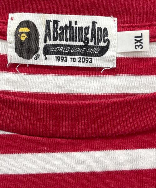 A BATHING APE（アベイシングエイプ）A BATHING APE (アベイシングエイプ) ロングスリーブカットソー レッド×ホワイト サイズ:3XLの古着・服飾アイテム