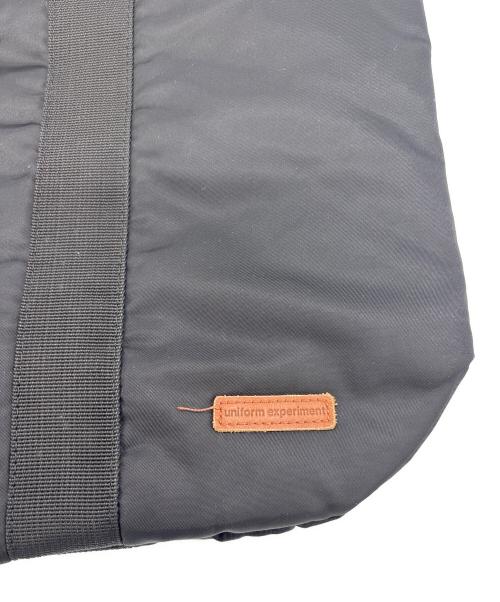 uniform experiment（ユニフォームエクスペリメント）uniform experiment (ユニフォームエクスペリメント) ALPHA INDUSTRIES. ショルダーバッグ ブラック×オレンジの古着・服飾アイテム