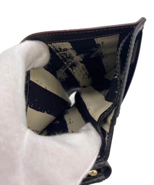 Vivienne Westwood（ヴィヴィアンウエストウッド）Vivienne Westwood (ヴィヴィアンウエストウッド) 3つ折りがま口財布 ブラックの古着・服飾アイテム