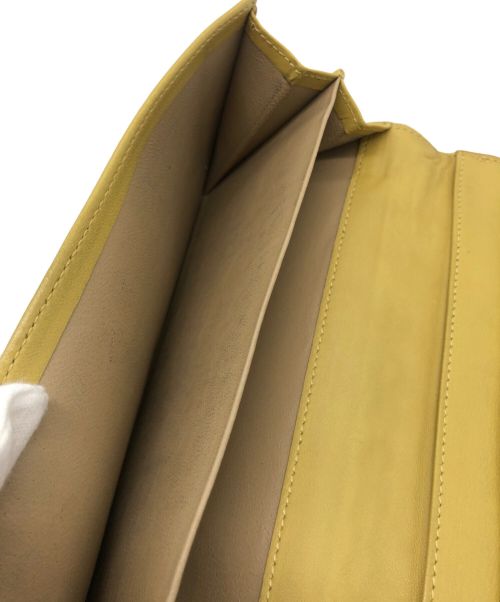 BOTTEGA VENETA（ボッテガベネタ）BOTTEGA VENETA (ボッテガベネタ) 長財布 イエローの古着・服飾アイテム