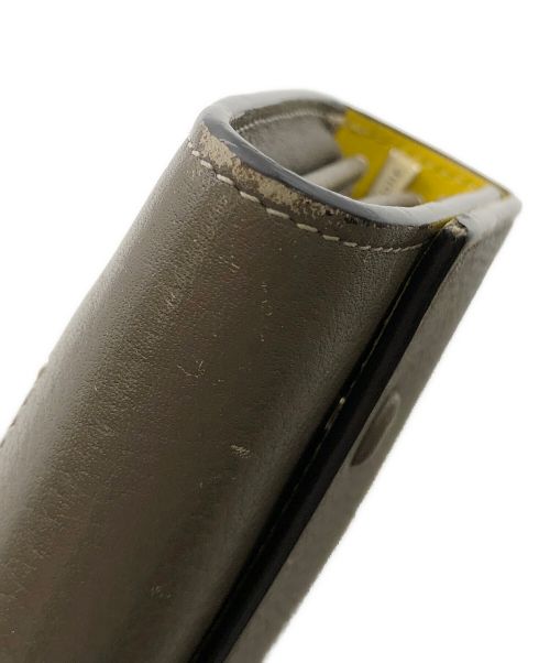 CELINE（セリーヌ）CELINE (セリーヌ) ラージフラップ マルチファンクション ウォレット ベージュ×イエローの古着・服飾アイテム