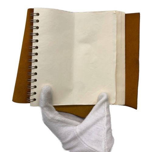 HERMES（エルメス）HERMES (エルメス) メモ帳カバー オレンジの古着・服飾アイテム