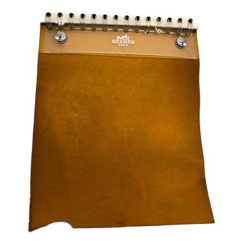 HERMES（エルメス）HERMES (エルメス) メモ帳カバー オレンジの古着・服飾アイテム
