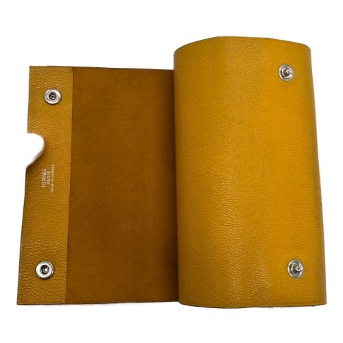 HERMES（エルメス）HERMES (エルメス) メモ帳カバー オレンジの古着・服飾アイテム